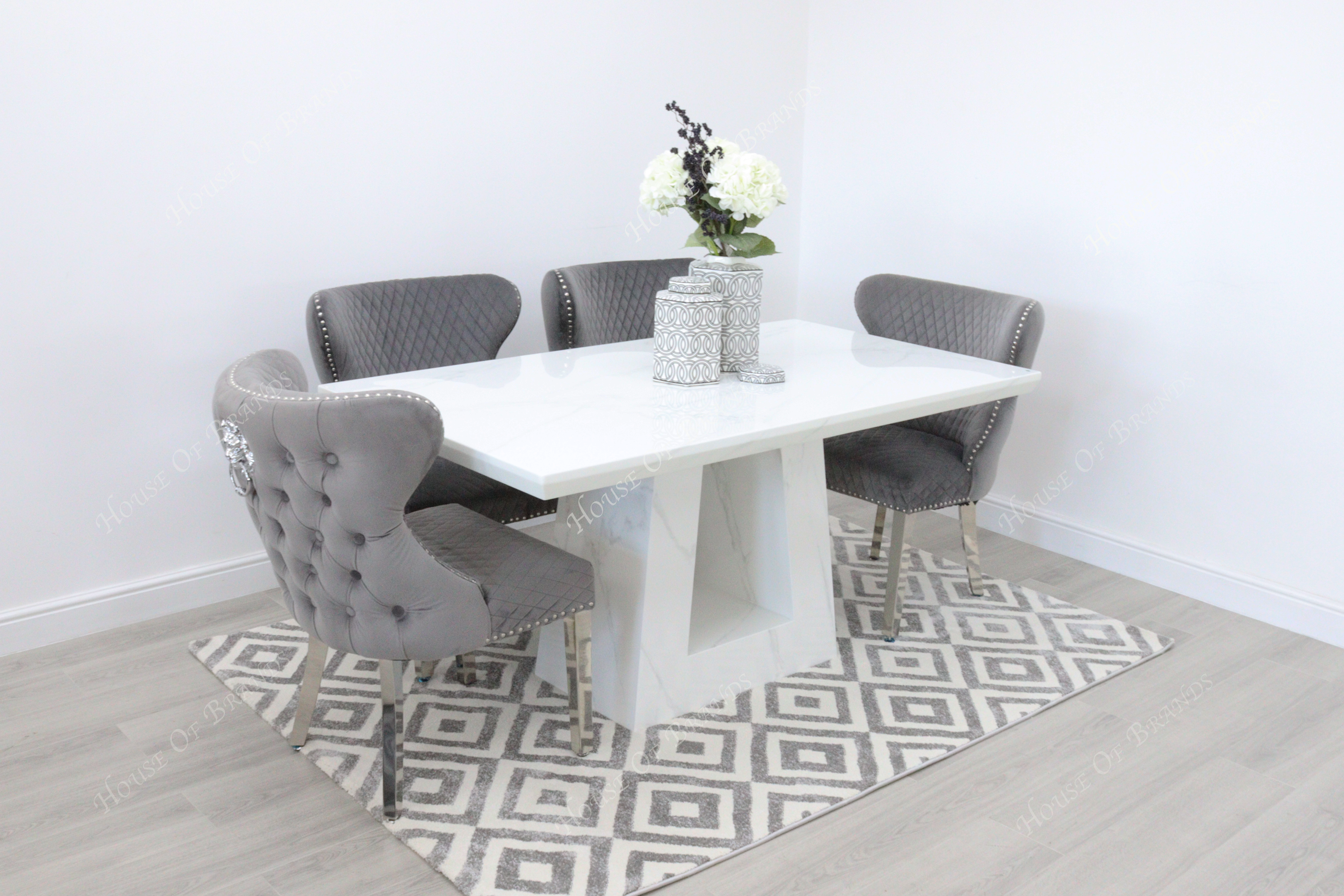 Rio White Marble Dining Table with 4 Valentino Velvet Knockerback Dining Chairs