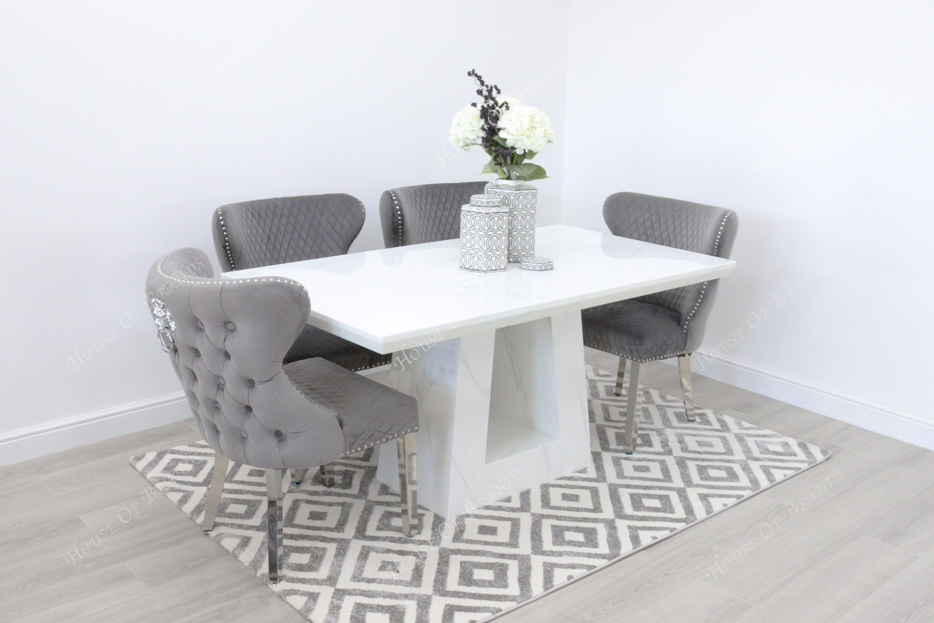 Rio White Marble Dining Table with 4 Valentino Velvet Knockerback Dining Chairs