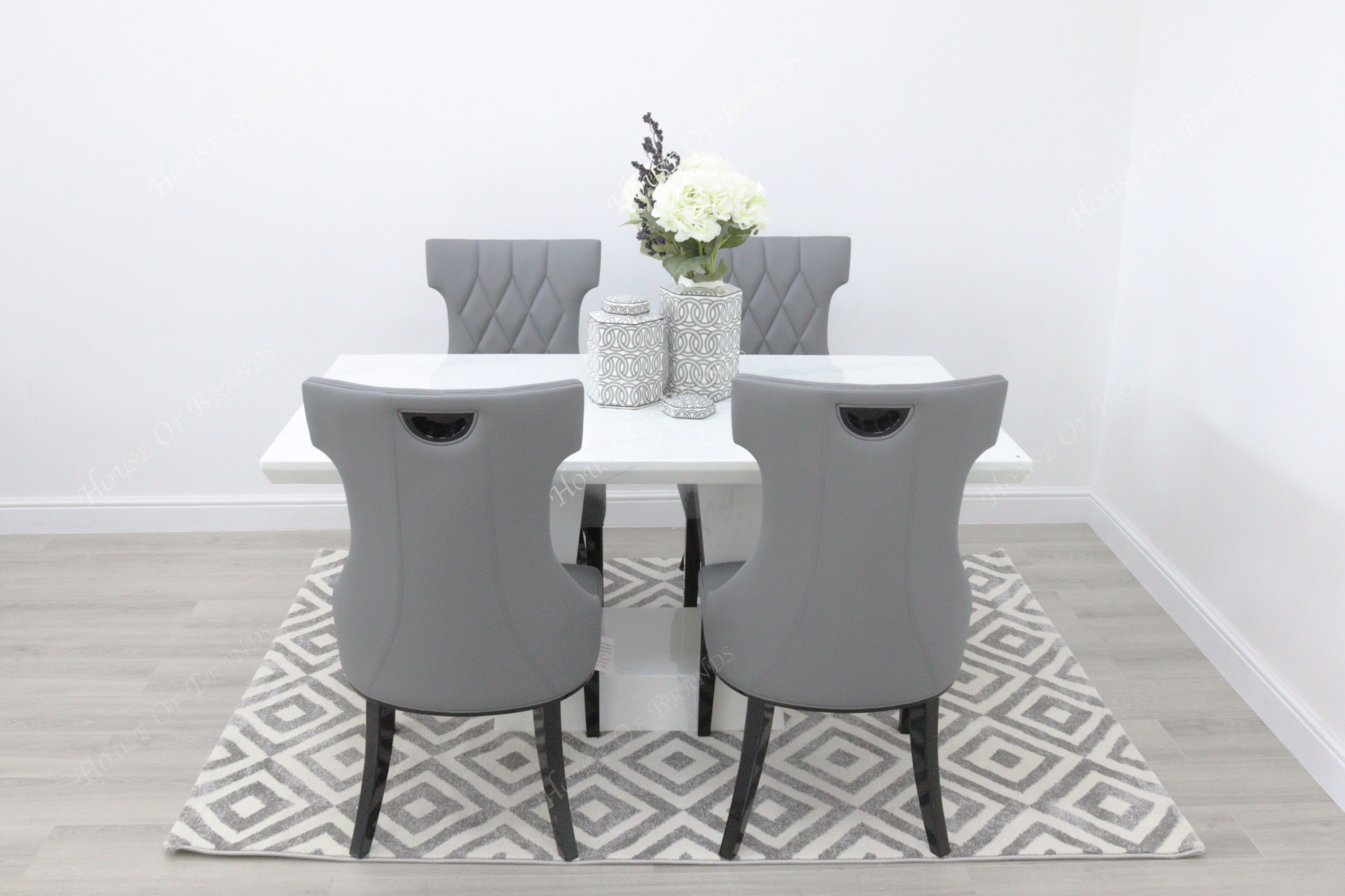 Rio White Marble Dining Table with 4 Tremiti Grey Leather Dining Chairs