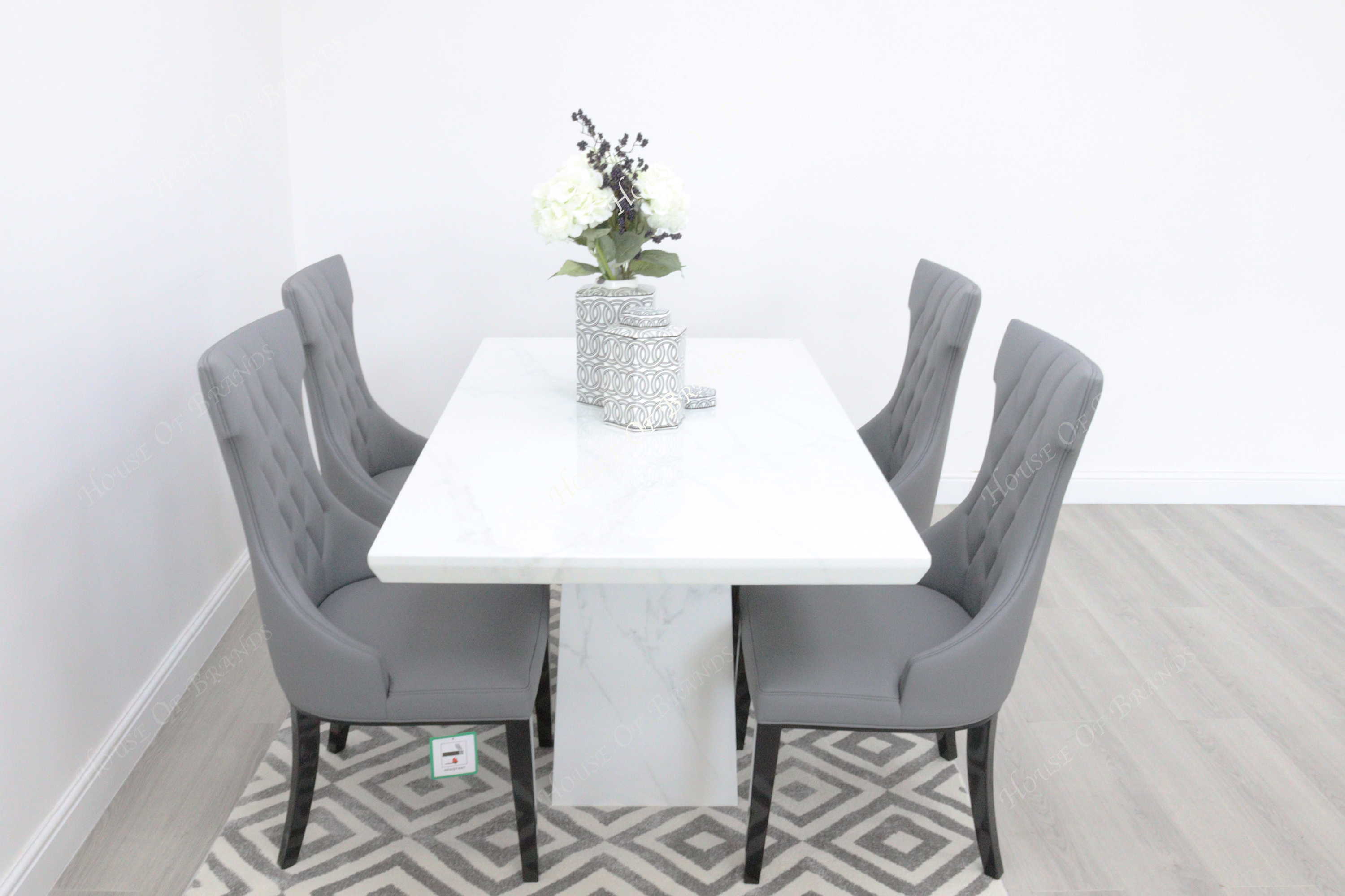 Rio White Marble Dining Table with 4 Tremiti Grey Leather Dining Chairs