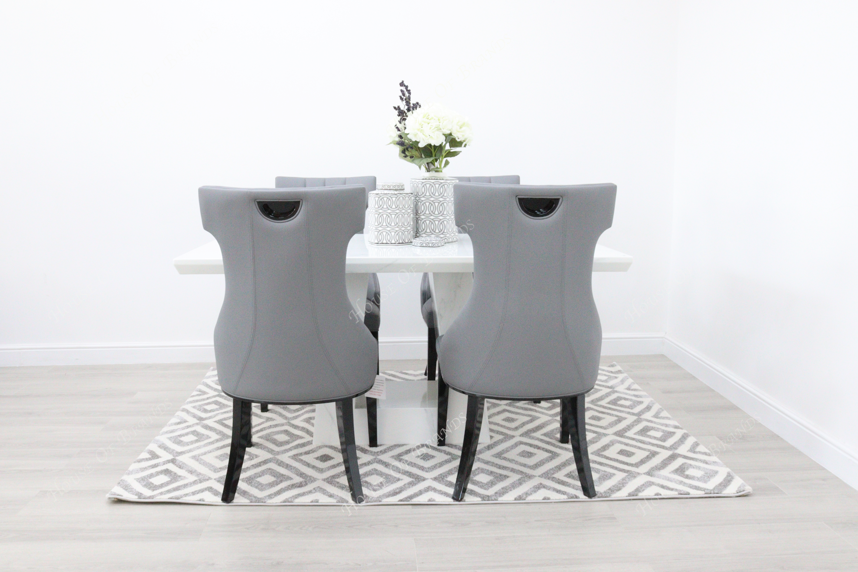Rio White Marble Dining Table with 4 Tremiti Grey Leather Dining Chairs