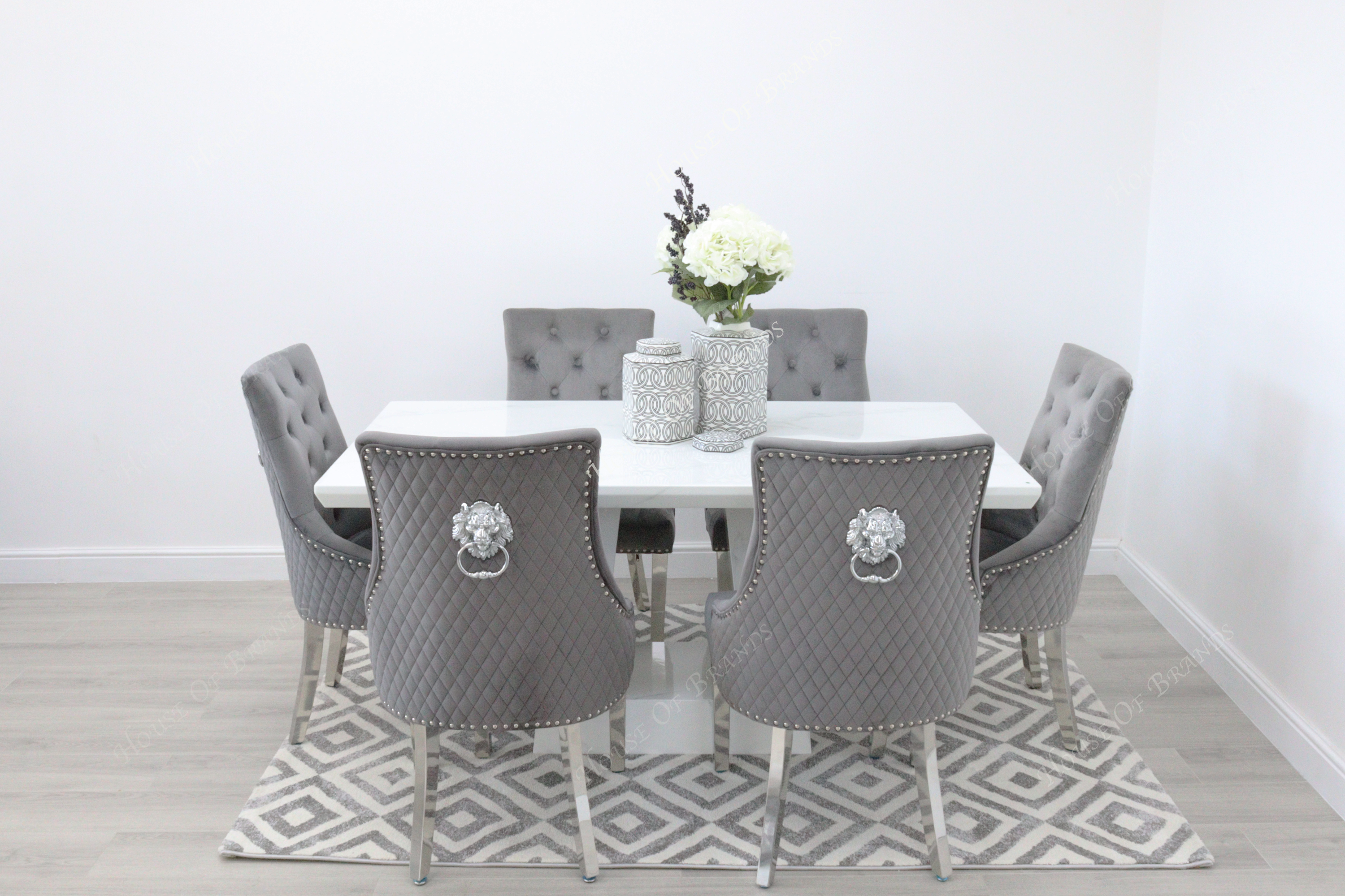 Rio White Marble Dining Table with 6 Majestic Knockerback Velvet Dining Chairs