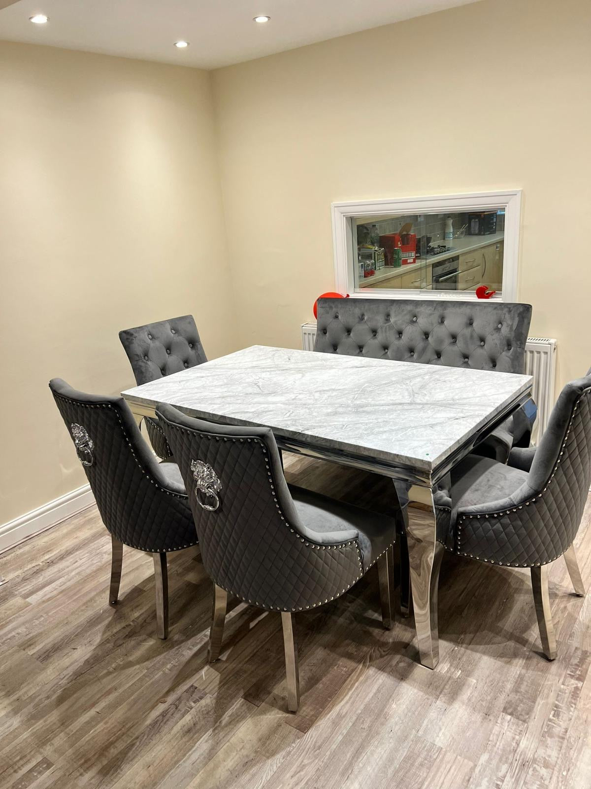 150cm Louis Marble Dining Table with 4 Majestic Knockerback Velvet Chairs and Majestic High Back Velvet Bench