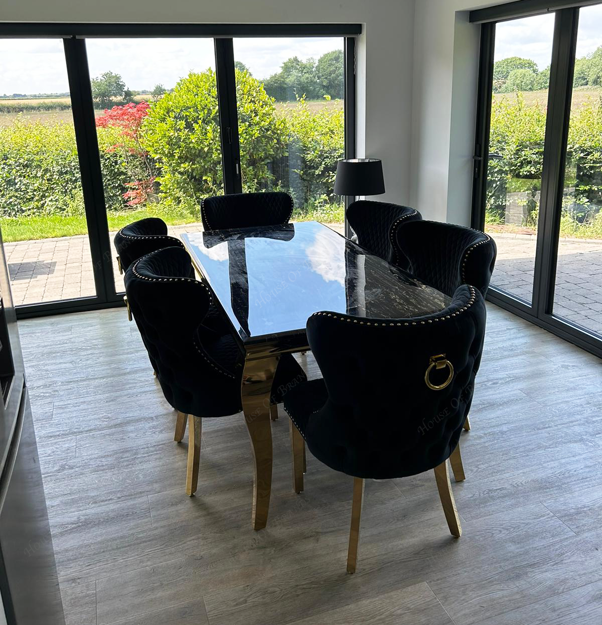 180cm Black and Gold Louis Marble Dining Table with Black and Gold Valentino Ring Knockerback Velvet Chairs