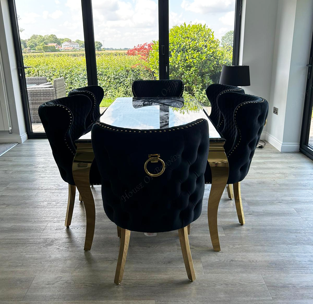 180cm Black and Gold Louis Marble Dining Table with Black and Gold Valentino Ring Knockerback Velvet Chairs