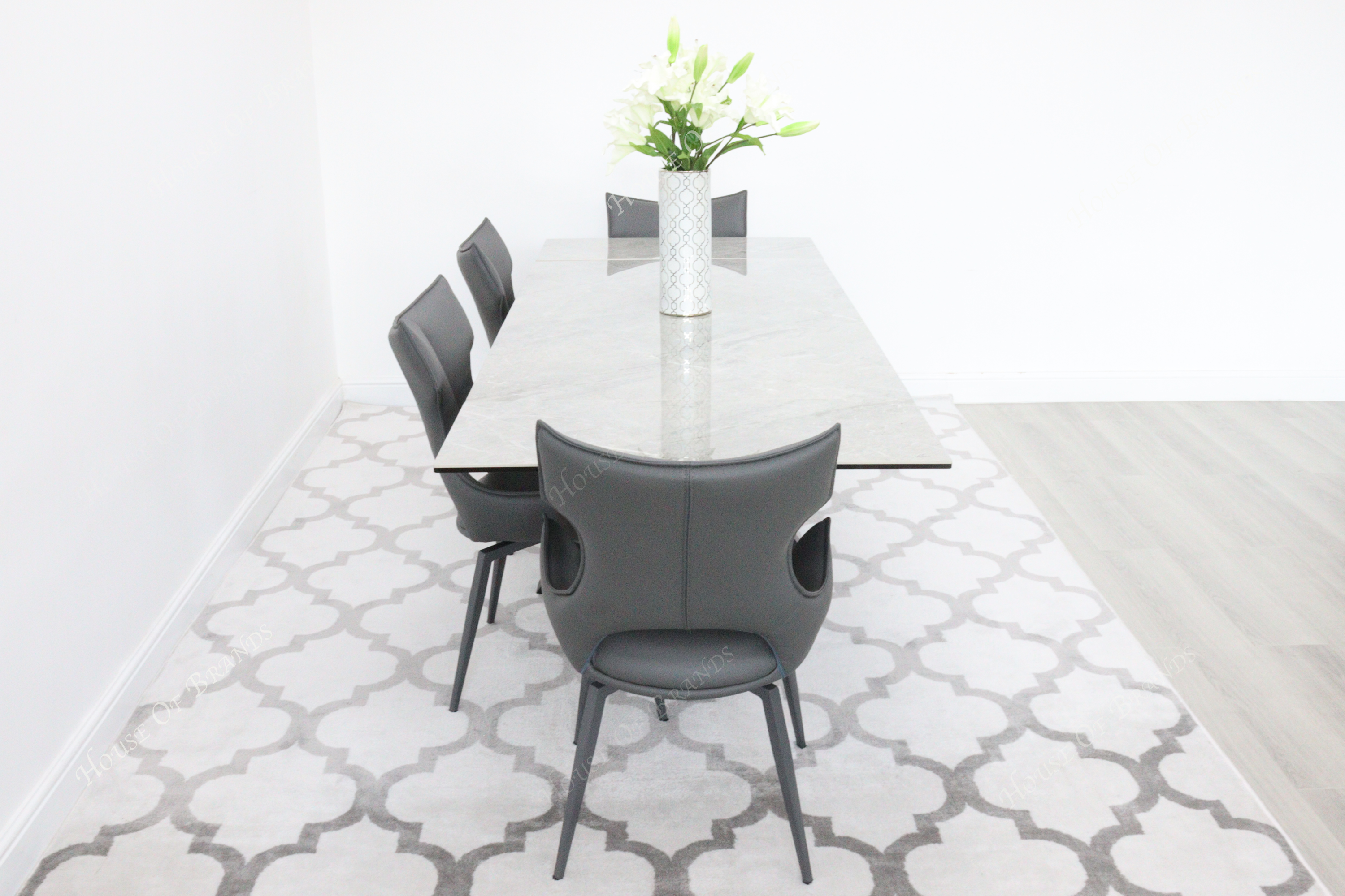 Phoenix Extendable Ceramic Dining Table and 4 Grey Rafaello Swivel Dining Chairs