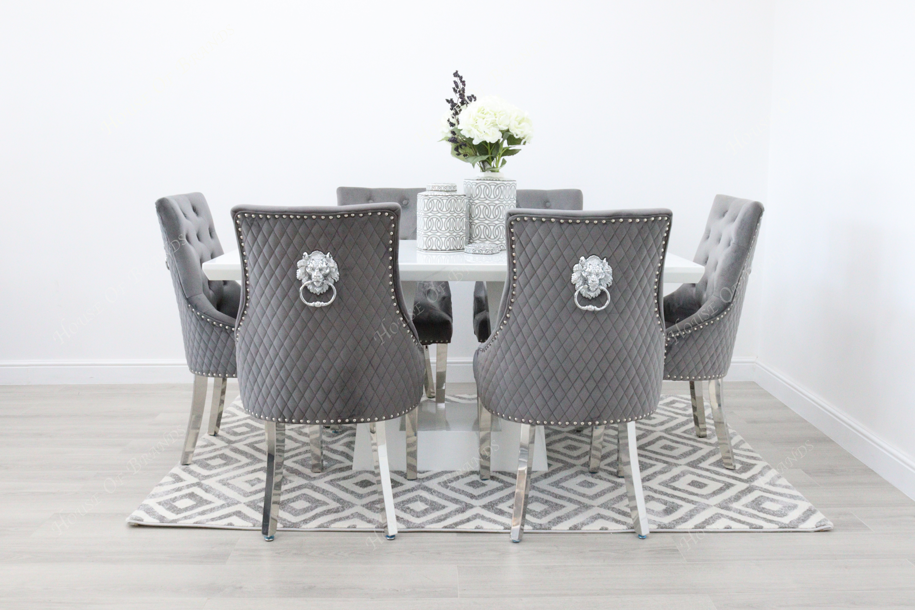 Rio White Marble Dining Table with 6 Majestic Knockerback Velvet Dining Chairs