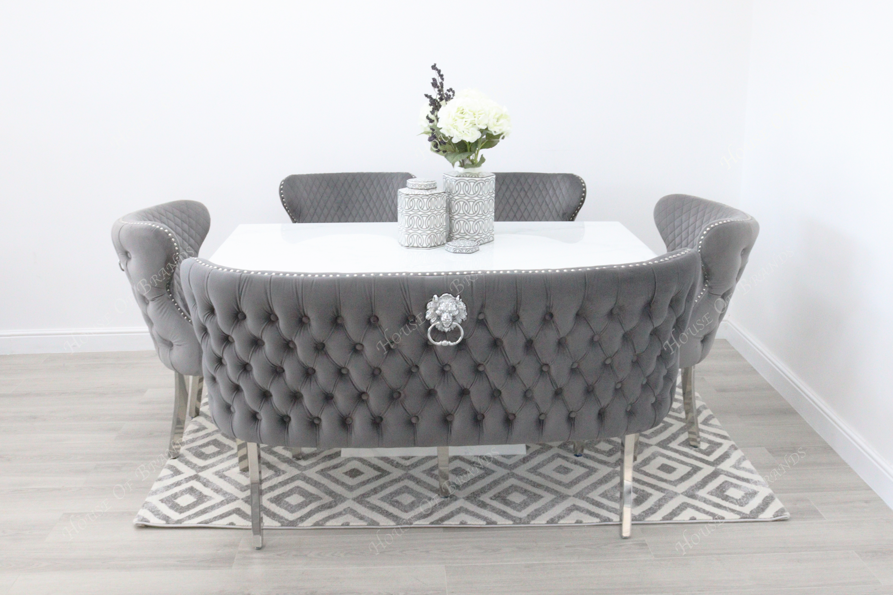 Rio White Marble Dining Table with 4 Valentino Velvet Knockerback Dining Chairs and Valenica Velvet Knocker Bench