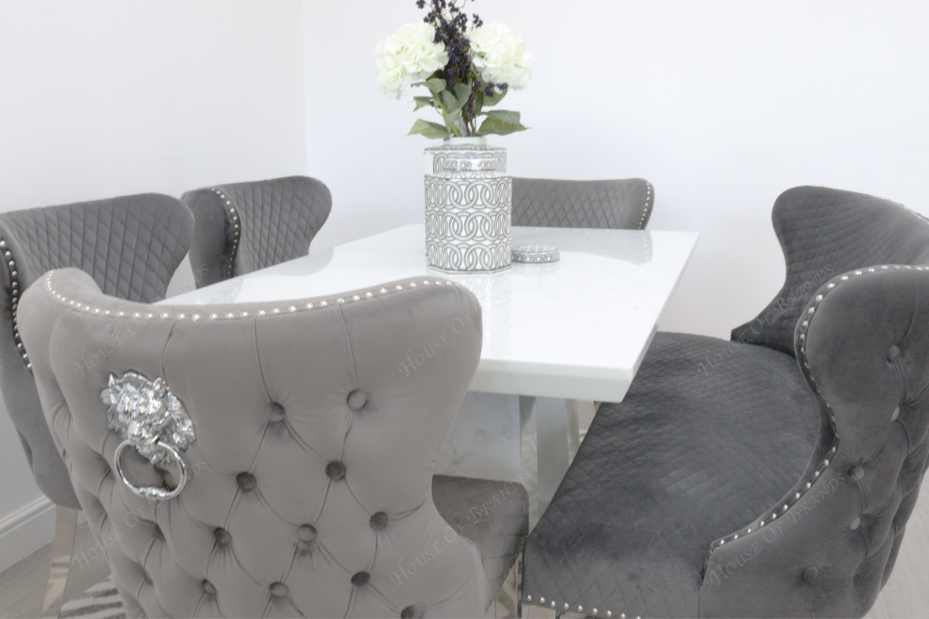 Rio White Marble Dining Table with 4 Valentino Velvet Knockerback Dining Chairs and Valenica Velvet Knocker Bench