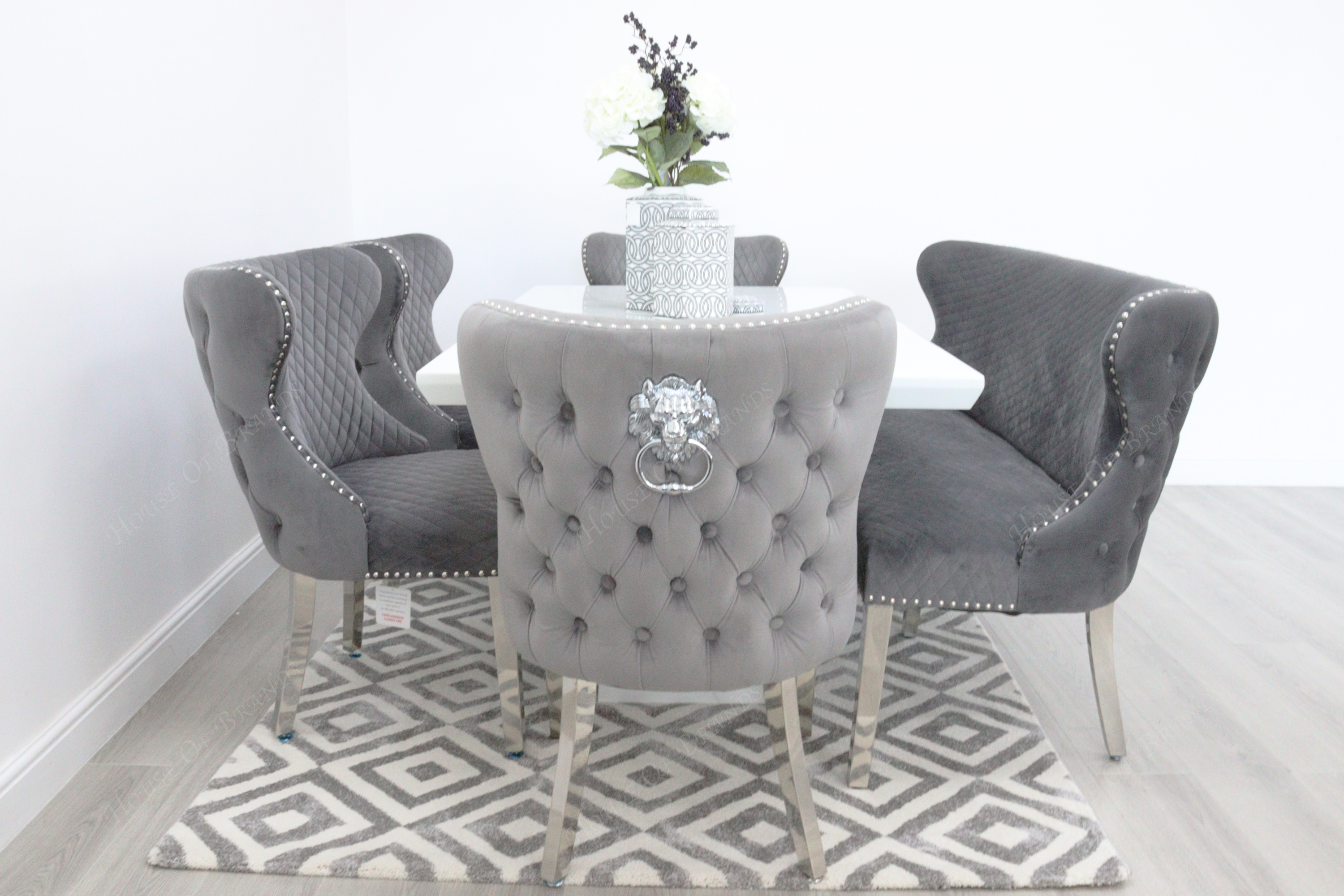 Rio White Marble Dining Table with 4 Valentino Velvet Knockerback Dining Chairs and Valenica Velvet Knocker Bench