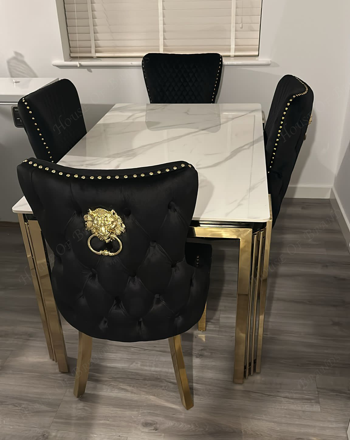 180cm Sorrento Rectangle Gold Ceramic Dining Table and Black Victoria Gold Dining Chairs