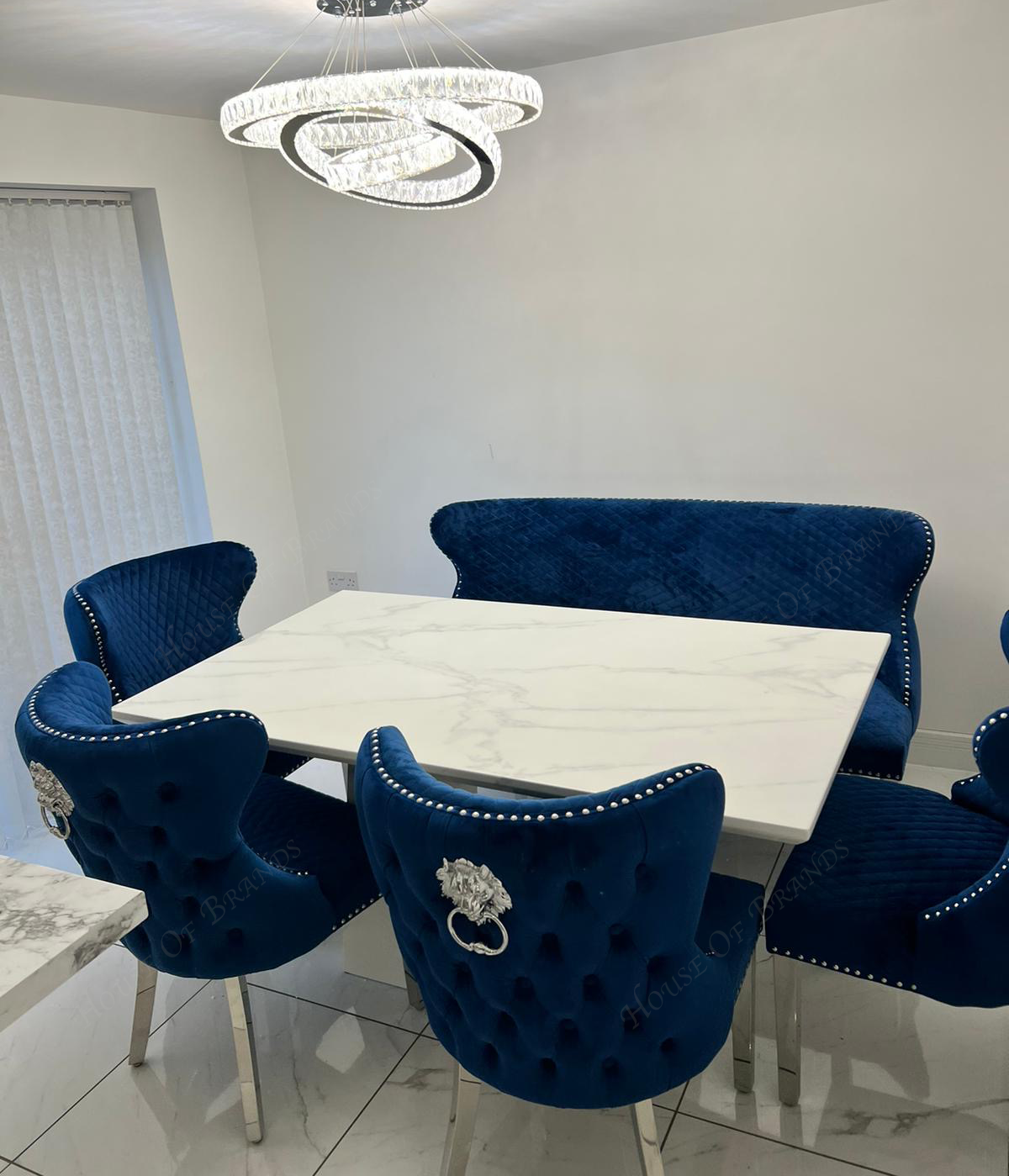 Rio White Marble Dining Table with 4 Valentino Velvet Knockerback Dining Chairs and Valenica Velvet Knocker Bench