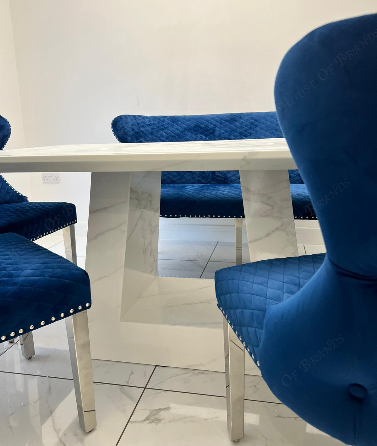 Rio White Marble Dining Table with 4 Valentino Velvet Knockerback Dining Chairs and Valenica Velvet Knocker Bench