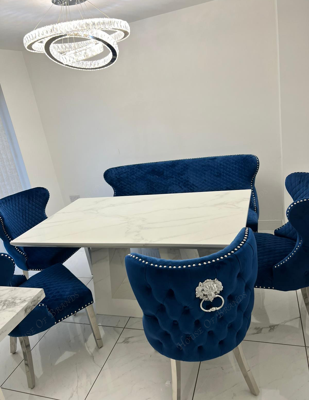 Rio White Marble Dining Table with 4 Valentino Velvet Knockerback Dining Chairs and Valenica Velvet Knocker Bench