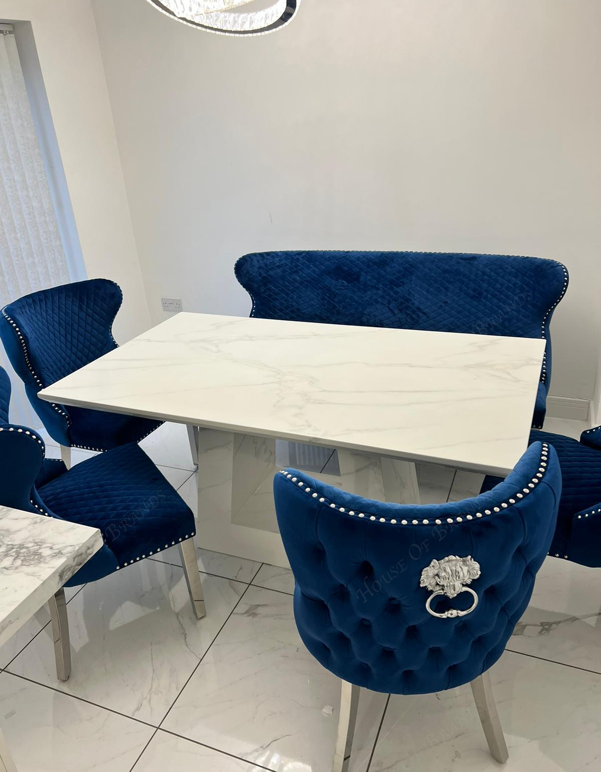 Rio White Marble Dining Table with 4 Valentino Velvet Knockerback Dining Chairs and Valenica Velvet Knocker Bench