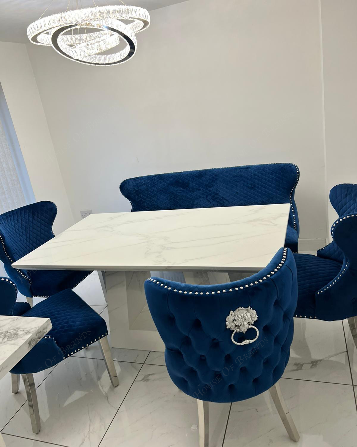 Rio White Marble Dining Table with 4 Valentino Velvet Knockerback Dining Chairs and Valenica Velvet Knocker Bench