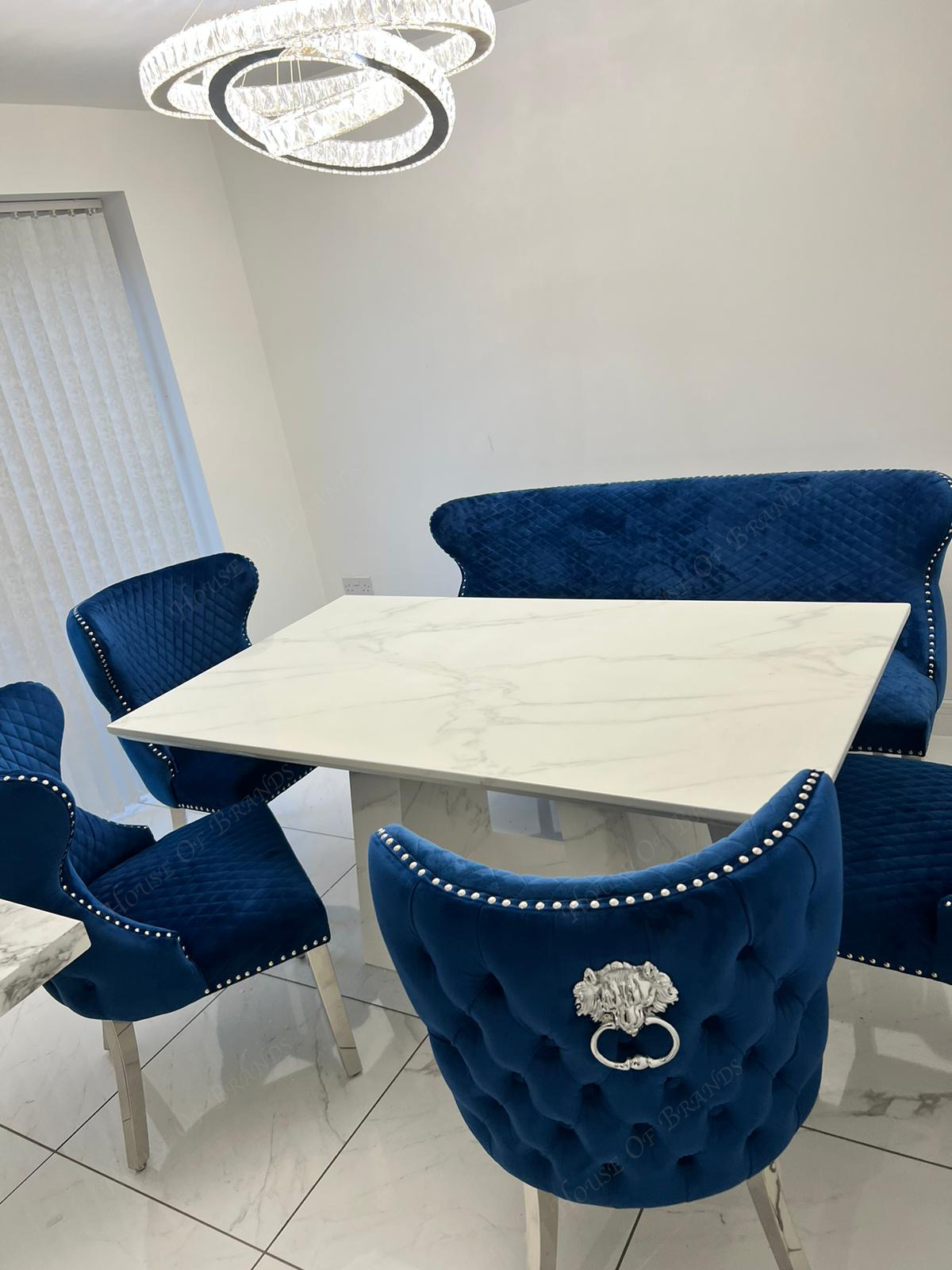 Rio White Marble Dining Table with 4 Valentino Velvet Knockerback Dining Chairs and Valenica Velvet Knocker Bench