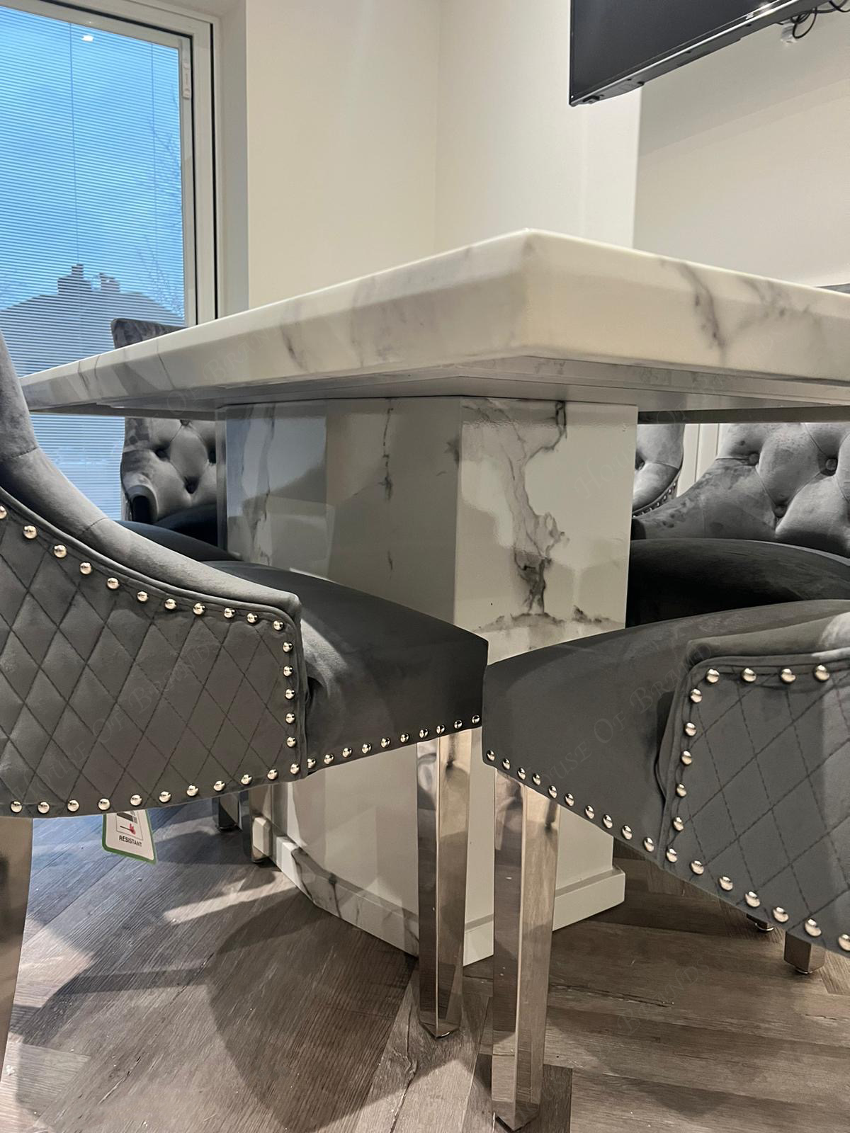 Athens White Marble Dining Table with Majestic Velvet Knockerback Dining Chairs