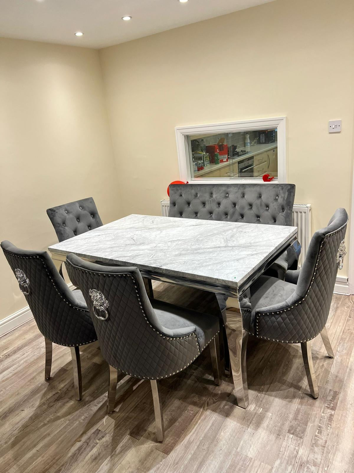 150cm Louis Marble Dining Table with 4 Majestic Knockerback Velvet Chairs and Majestic High Back Velvet Bench