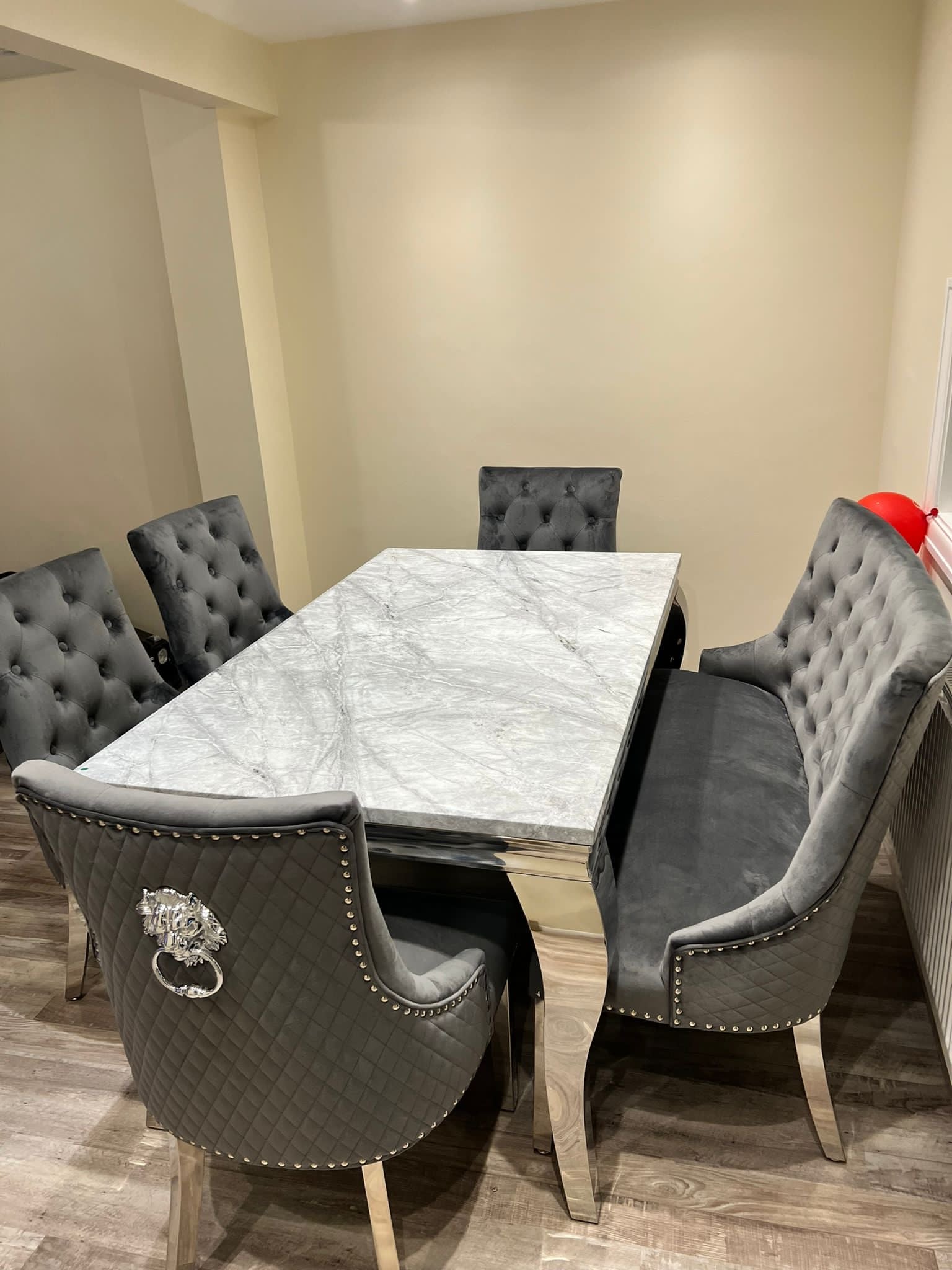 150cm Louis Marble Dining Table with 4 Majestic Knockerback Velvet Chairs and Majestic High Back Velvet Bench
