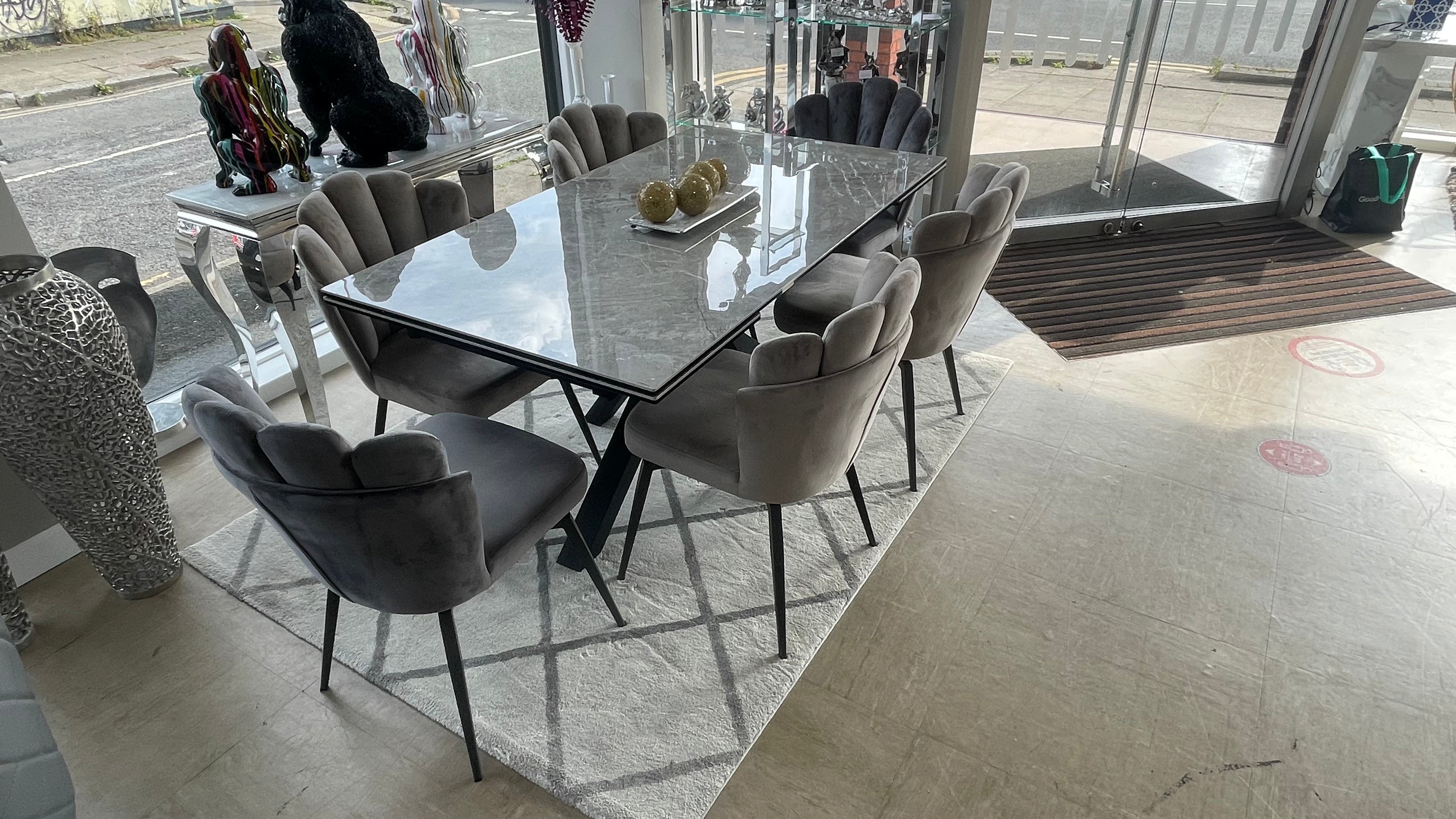 Phoenix Extendable Ceramic Dining Table and 6 Grey Ferrano Fabric Swivel Dining Chairs