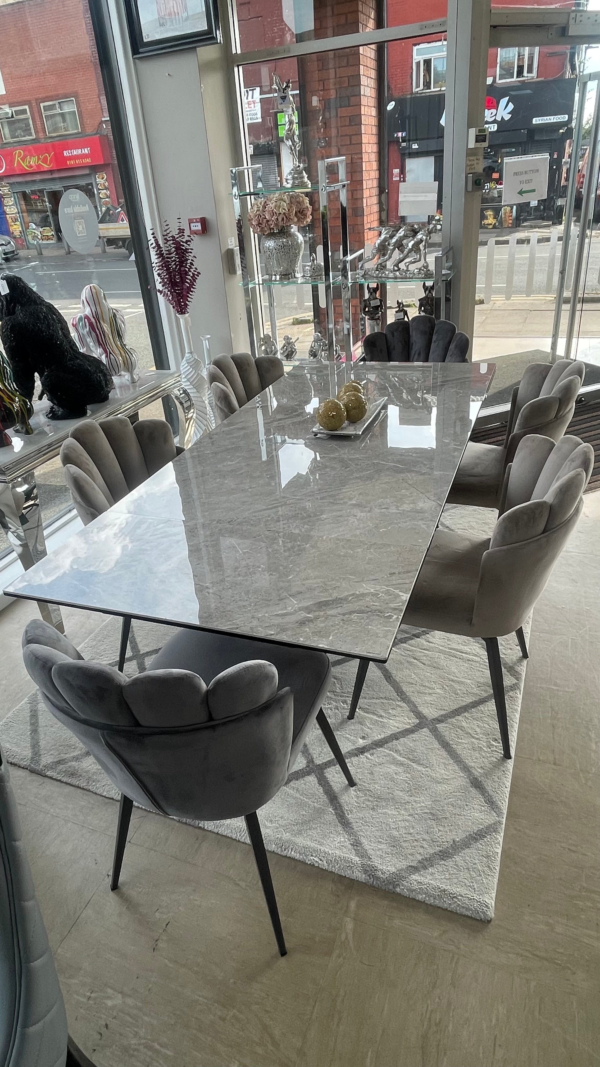 Phoenix Extendable Ceramic Dining Table and 6 Grey Ferrano Fabric Swivel Dining Chairs