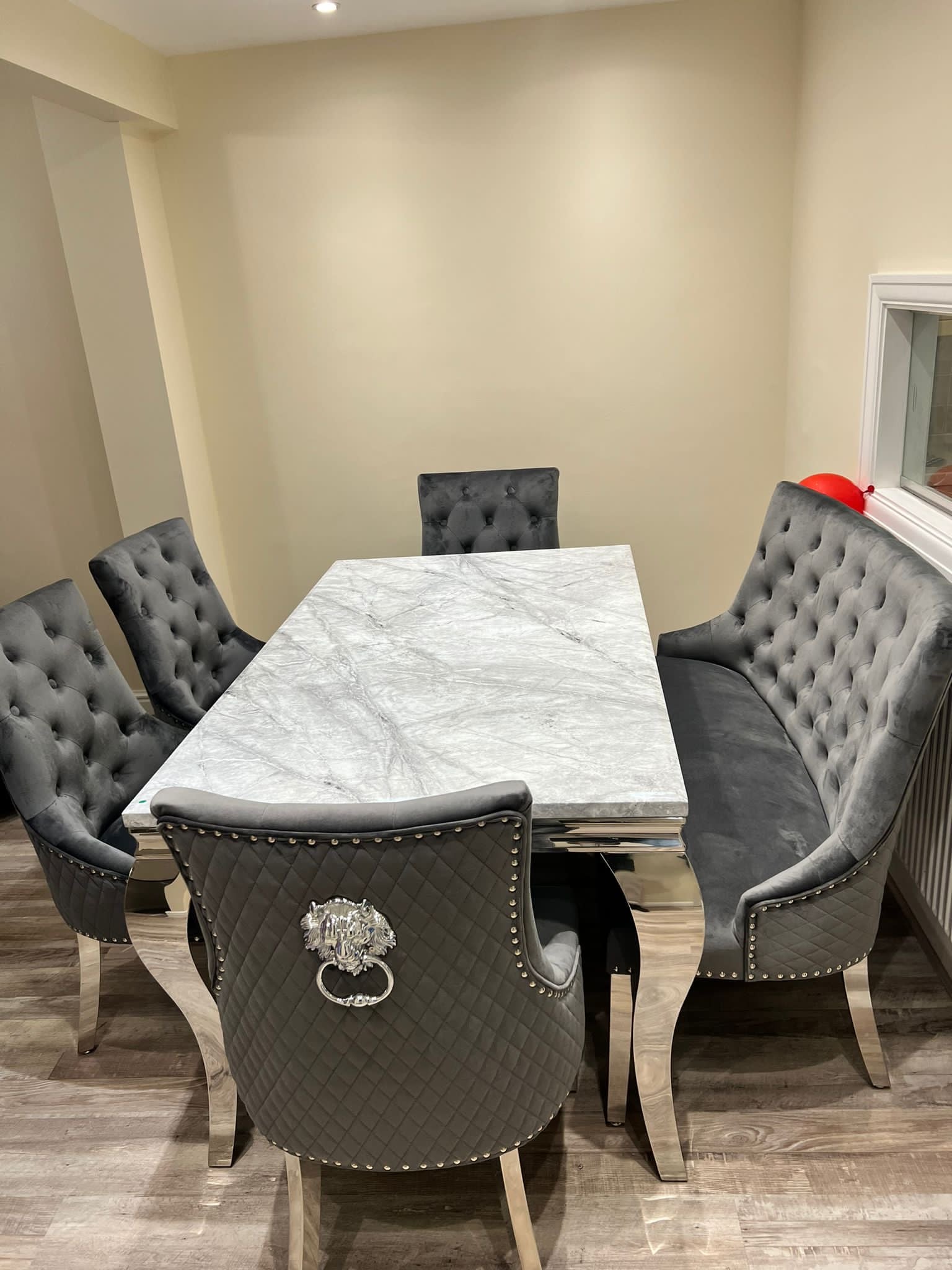 150cm Louis Marble Dining Table with 4 Majestic Knockerback Velvet Chairs and Majestic High Back Velvet Bench