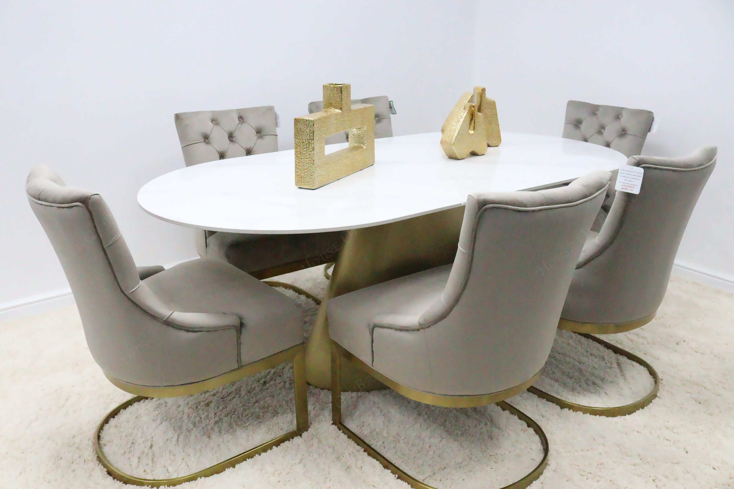 Orbit Gold Oval Dining Table with 6 Velvet Cupid Gold Dining Chairs